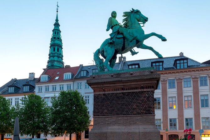 2-Hour Walking Introduction to Copenhagen and its Main Sights - Nyhavn: colorful houses with a hard past