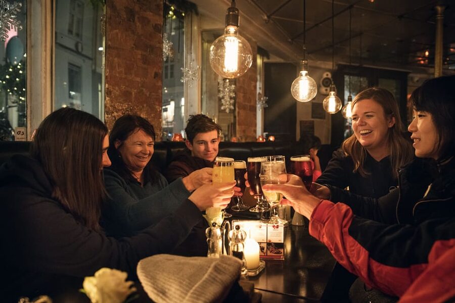 Copenhagen: Christmas Walking Tour with Treats and Drinks - Æbleskiver, gingerbread, and cake