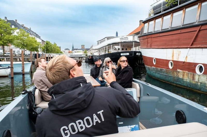 Copenhagen: Electric Canal Tour with Guide and Hot Drink - Royal Copenhagen at Amalienborg Palace