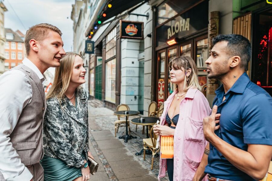 Copenhagen: Guided Party Pub Crawl with 4 Shots and 1 Drink - Weekend finish beside Tivoli