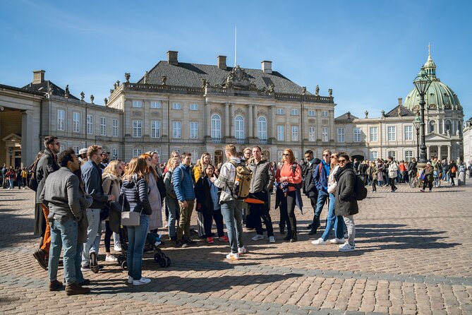Copenhagen Highlights Walking Tour - Starting beneath the orange umbrella at Højbro Plads