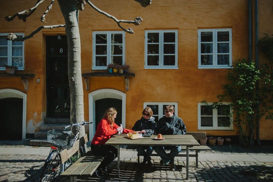 Copenhagen: Hygge and Happiness Culture Walking Tour - Cobblestones, timber houses, and old Copenhagen