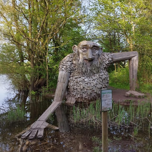 Copenhagen: Six Forgotten Giant Sculptures Tour by Bus - Sleeping Louis: the first search