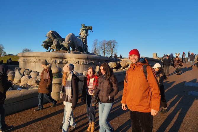 Walk & Canal Tour: Copenhagen Highlights + Changing of the Guards - Starting beneath the clock at Copenhagen Central Station